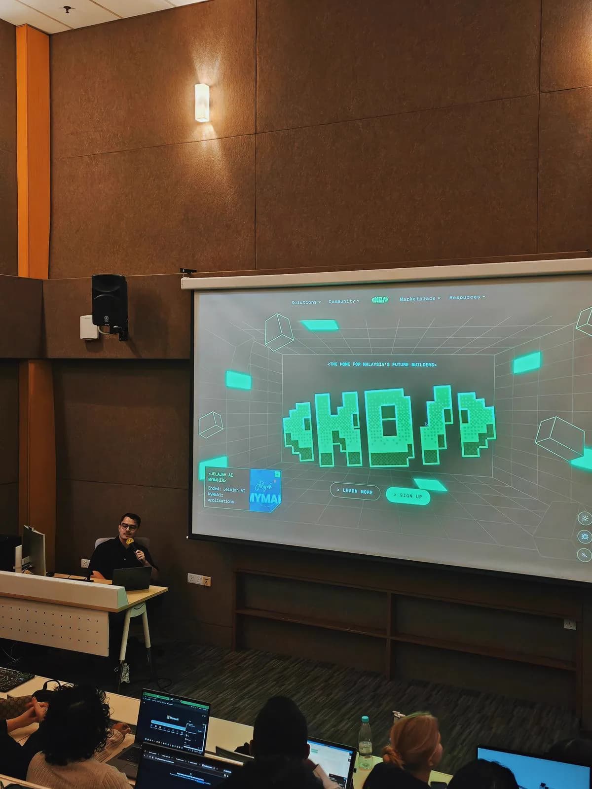 KrackedDevs screen shown during the Sunway University session.
